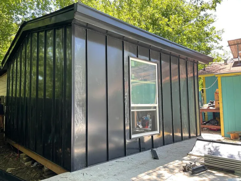 Black standing seam metal wall panels for Metal Roof Installation in South Holland